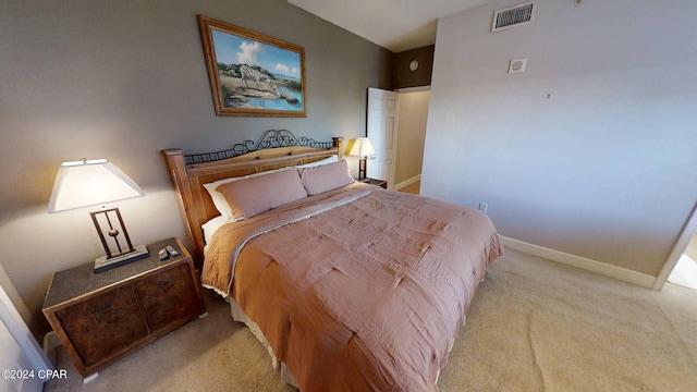 bedroom featuring light colored carpet