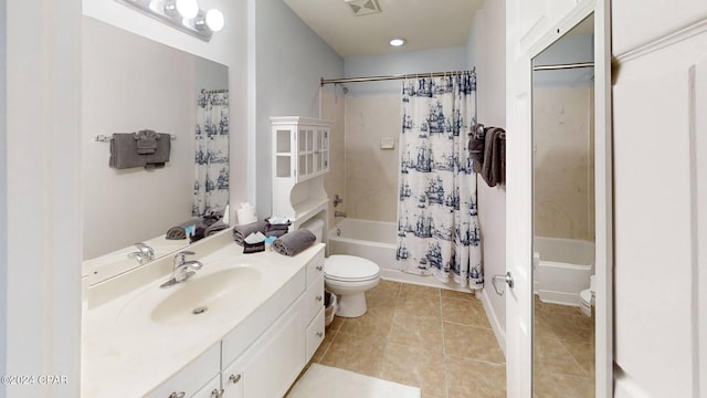 full bathroom featuring vanity, tile patterned flooring, toilet, and shower / bath combo