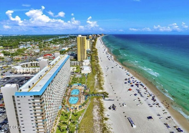 bird's eye view with a view of the beach and a water view