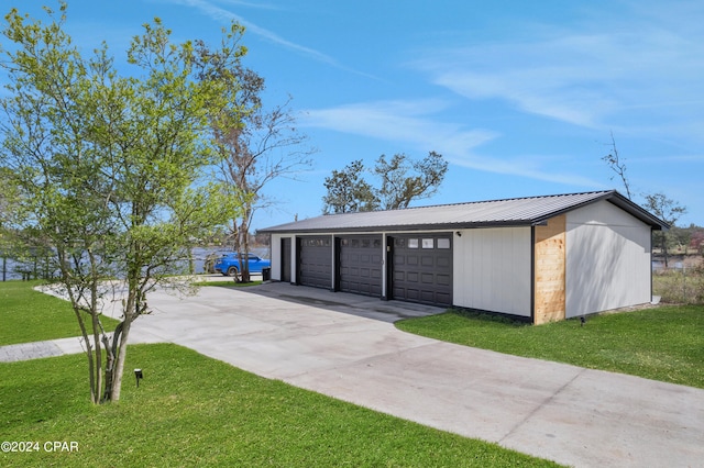 garage with a lawn