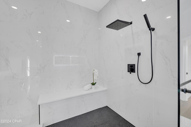 bathroom featuring tiled shower