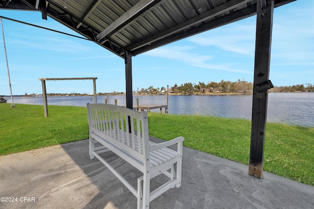 view of patio featuring a water view