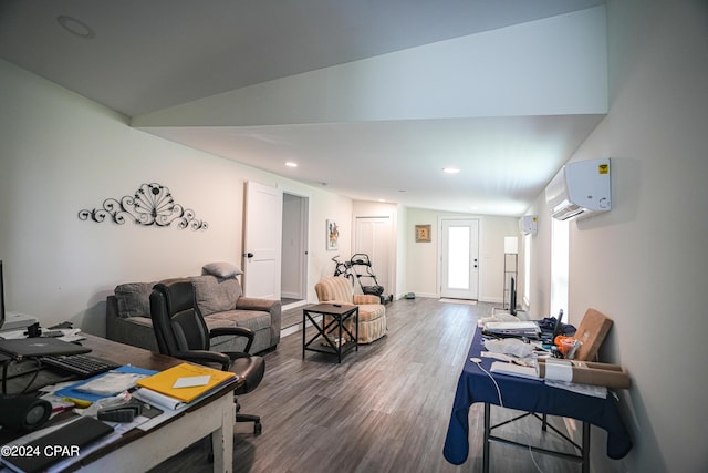 office area featuring wood finished floors, a wall mounted air conditioner, and recessed lighting