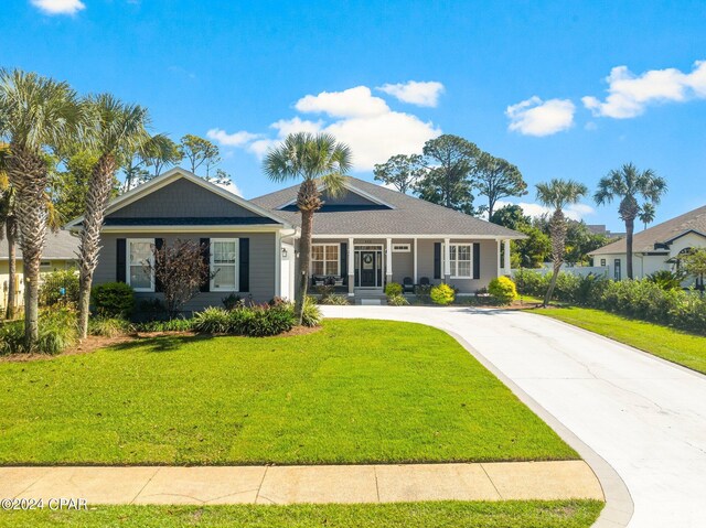 ranch-style house with a front lawn