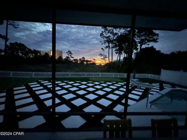 view of patio terrace at dusk