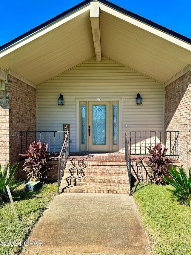 entrance to property with a porch