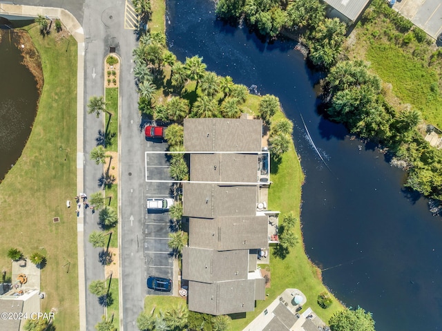 drone / aerial view with a water view