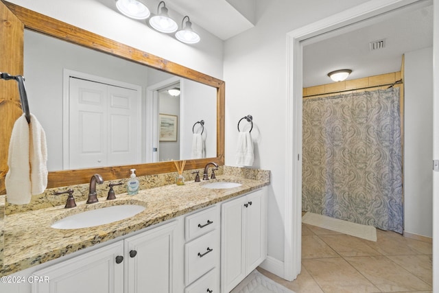 bathroom with vanity, tile patterned floors, and a shower with shower curtain