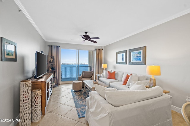 tiled living room featuring crown molding and ceiling fan