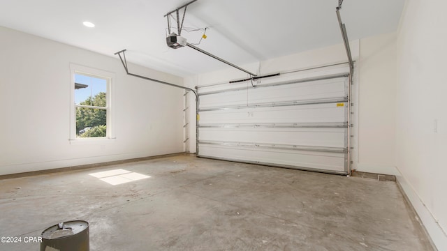 garage featuring a garage door opener