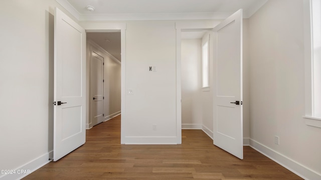 unfurnished bedroom featuring light hardwood / wood-style flooring and a closet