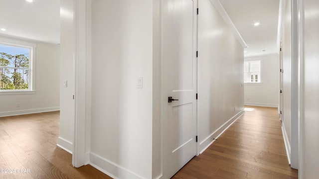 hallway with light wood-type flooring