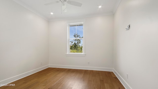 unfurnished room featuring ornamental molding, hardwood / wood-style flooring, and ceiling fan