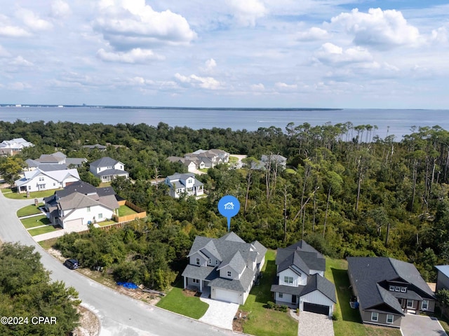 bird's eye view with a water view