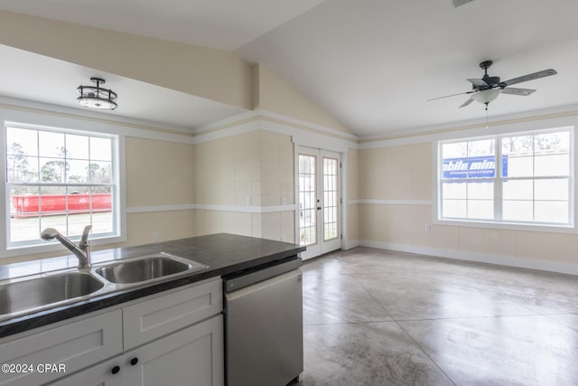 kitchen featuring french doors, sink, vaulted ceiling, stainless steel dishwasher, and ceiling fan