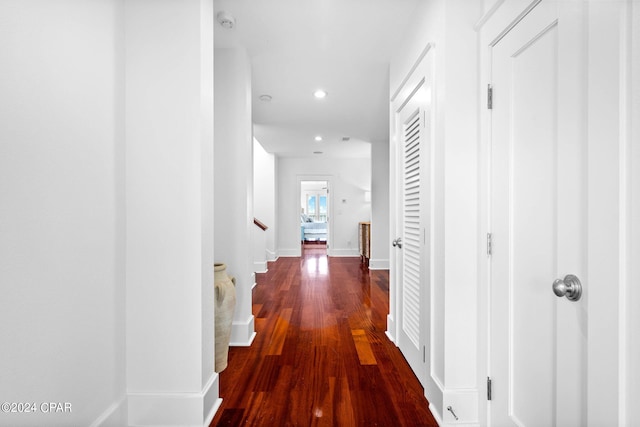 hall with wood-type flooring