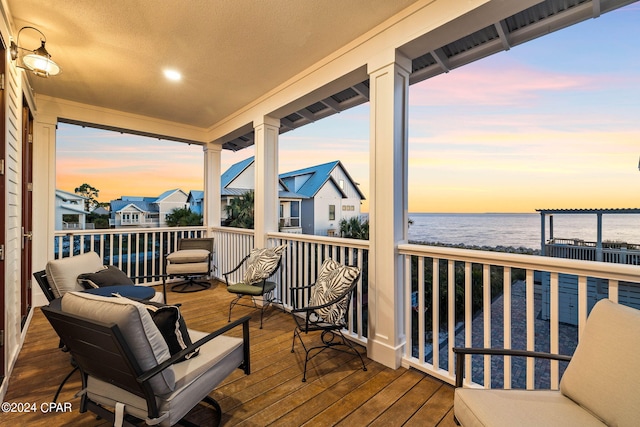 deck at dusk with a water view