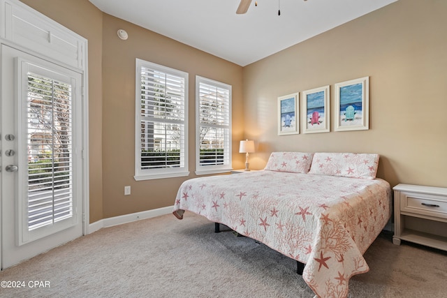 bedroom featuring carpet, access to exterior, and ceiling fan