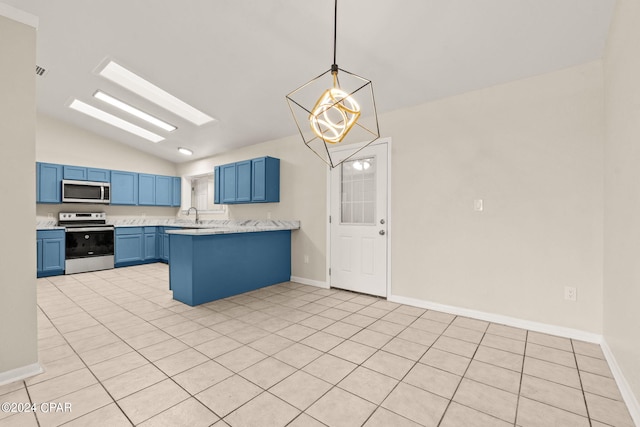 kitchen featuring appliances with stainless steel finishes, sink, blue cabinets, vaulted ceiling with skylight, and kitchen peninsula