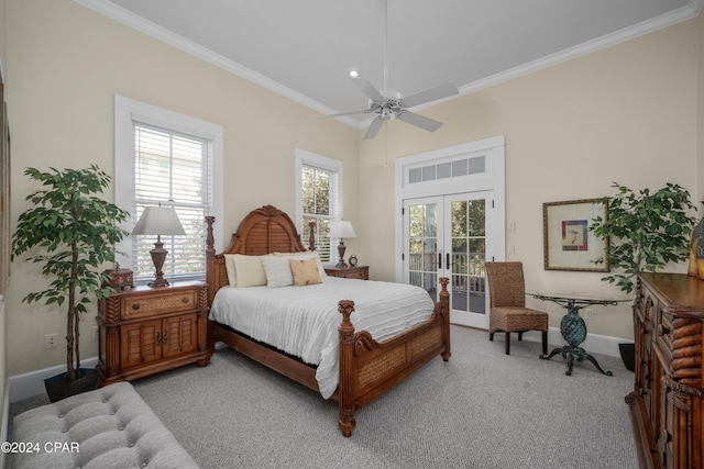 bedroom featuring access to exterior, french doors, multiple windows, and ceiling fan