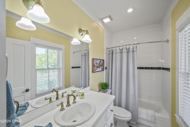 full bathroom with vanity, toilet, and shower / bathtub combination with curtain