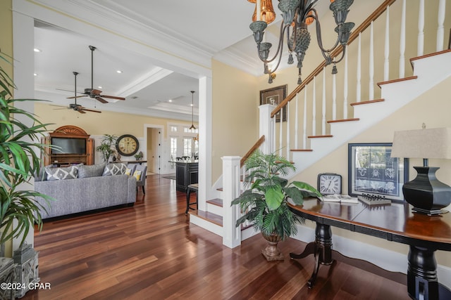 stairway featuring ceiling fan, hardwood / wood-style floors, crown molding, and french doors