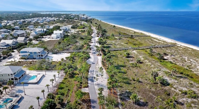 aerial view featuring a water view and a beach view