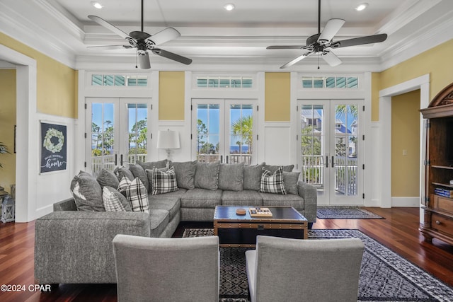 living room featuring ornamental molding, dark wood-type flooring, and french doors