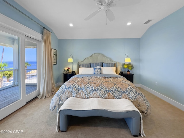 carpeted bedroom with access to outside, ceiling fan, and vaulted ceiling