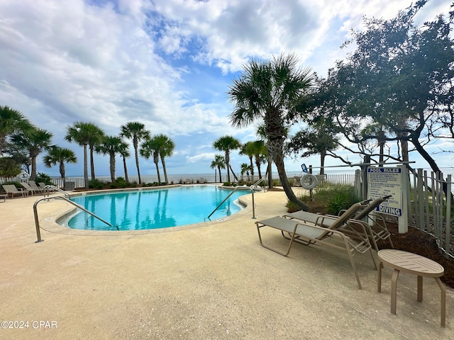 view of pool featuring a patio area