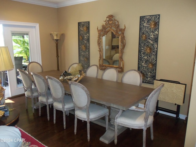 dining space featuring dark hardwood / wood-style floors and ornamental molding