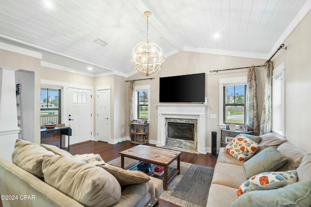 living room with a wealth of natural light, dark wood-type flooring, lofted ceiling with beams, and a premium fireplace