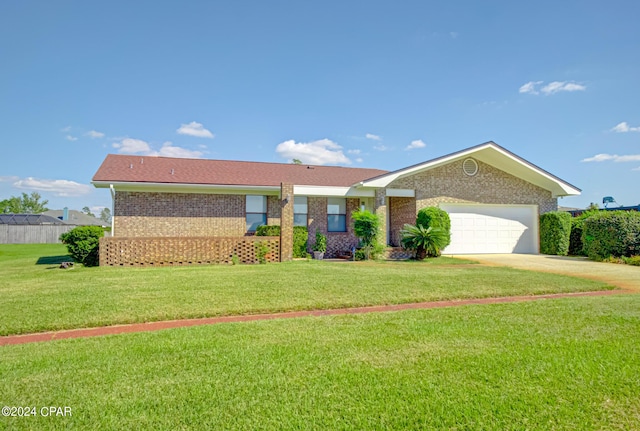 single story home with a front yard and a garage