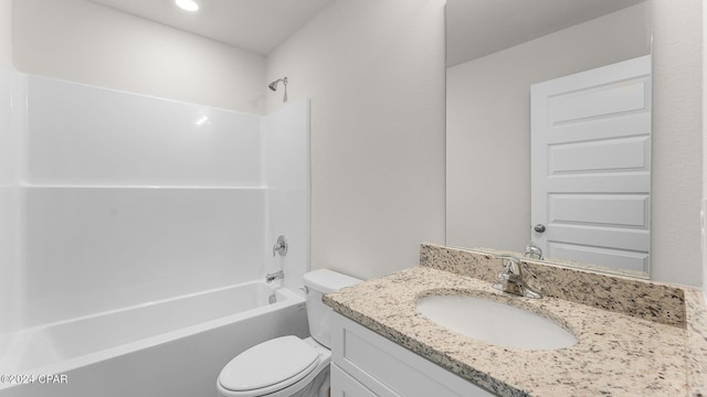 full bathroom with shower / washtub combination, vanity, and toilet