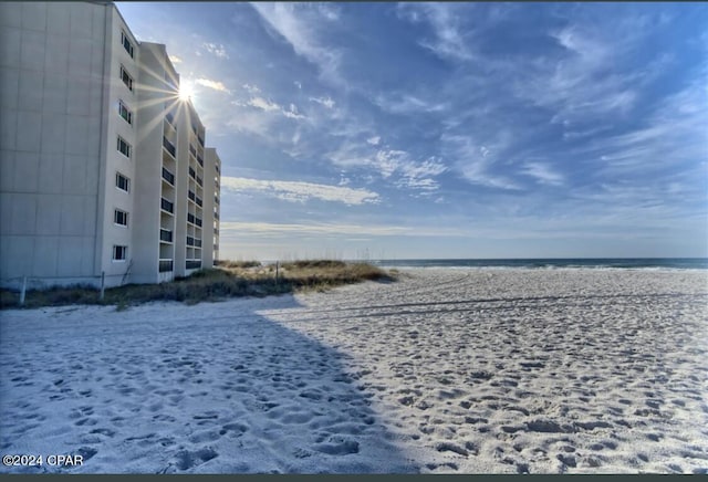 view of water feature with a beach view