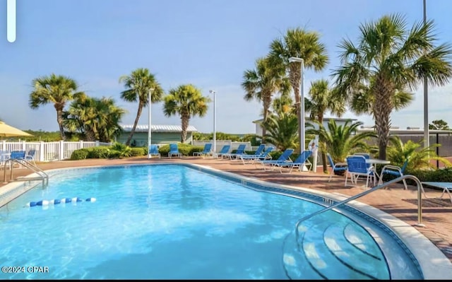 view of pool with a patio