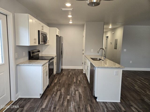 kitchen featuring white cabinets, dark hardwood / wood-style floors, sink, and stainless steel appliances