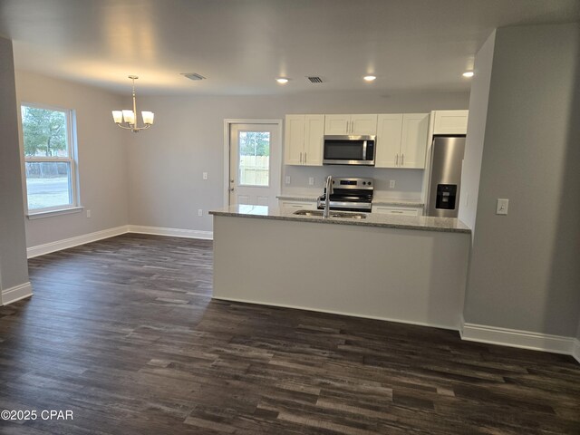 empty room featuring ceiling fan and dark wood-type flooring