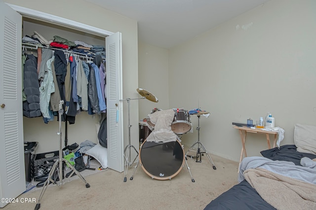 bedroom with a closet and carpet