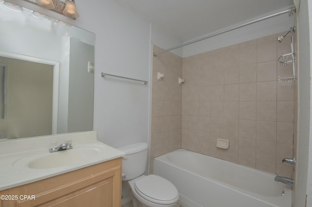 full bathroom featuring toilet, vanity, and shower / bathtub combination