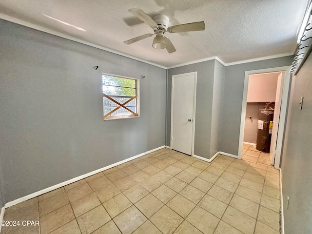 unfurnished bedroom featuring ornamental molding, a closet, ceiling fan, electric water heater, and light tile patterned floors