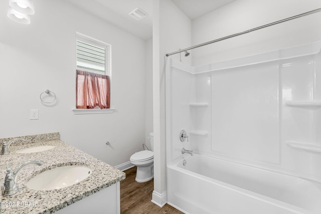 full bathroom featuring vanity, shower / bathing tub combination, toilet, and hardwood / wood-style flooring