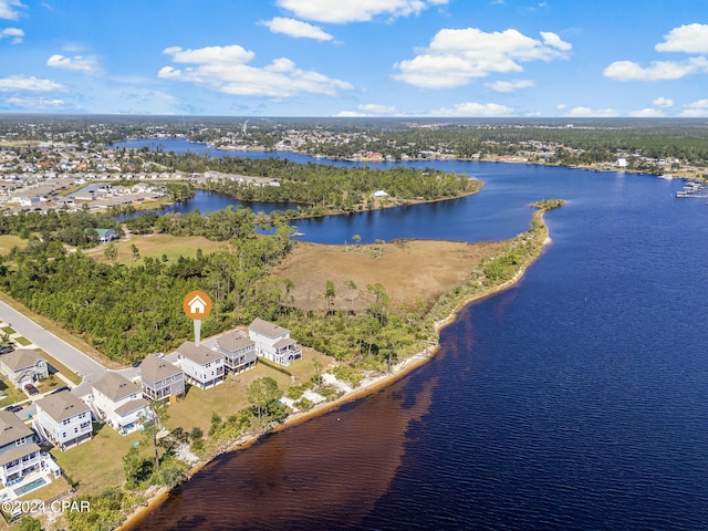 drone / aerial view with a water view