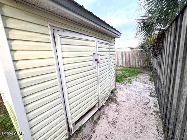 view of outbuilding with a fenced backyard