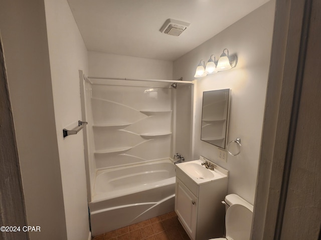 full bathroom with toilet, washtub / shower combination, vanity, and tile patterned floors