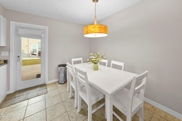 dining room featuring light tile patterned flooring