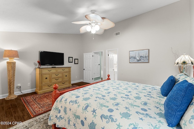 bedroom featuring ceiling fan, vaulted ceiling, and dark hardwood / wood-style floors