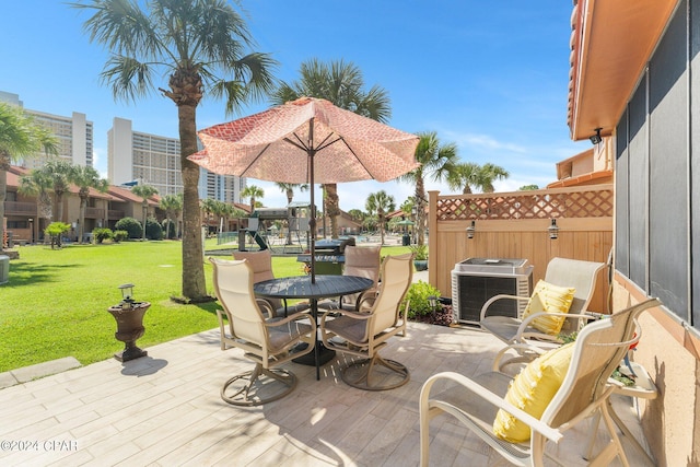 view of patio / terrace featuring central AC and a wooden deck