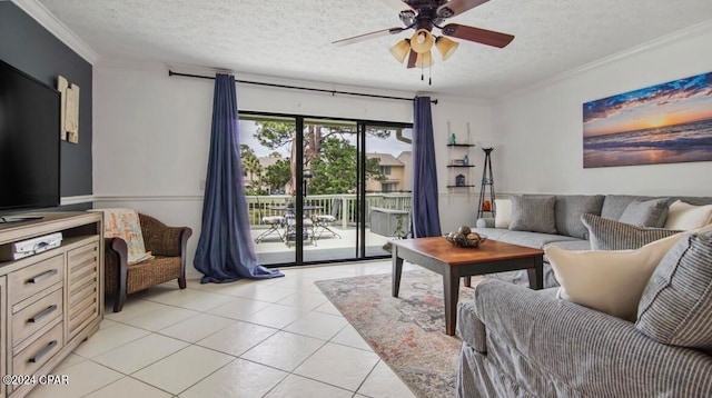 tiled living room with ornamental molding, ceiling fan, and a textured ceiling