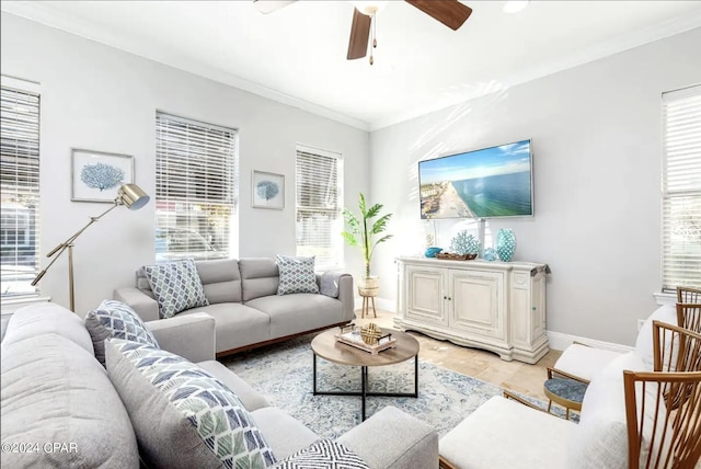 living room featuring crown molding and ceiling fan